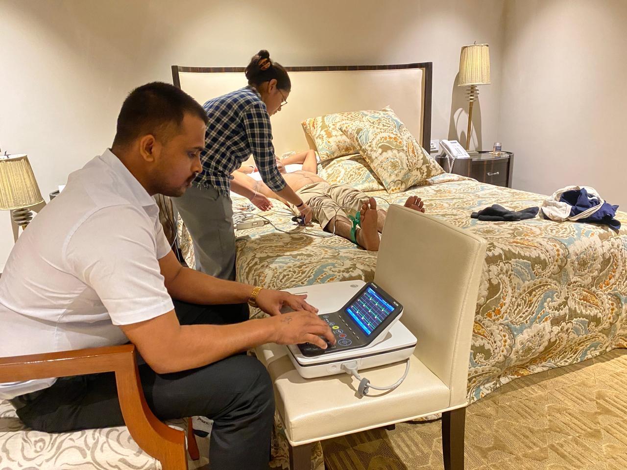 Portable 12-lead ECG being recorded at a patient's home